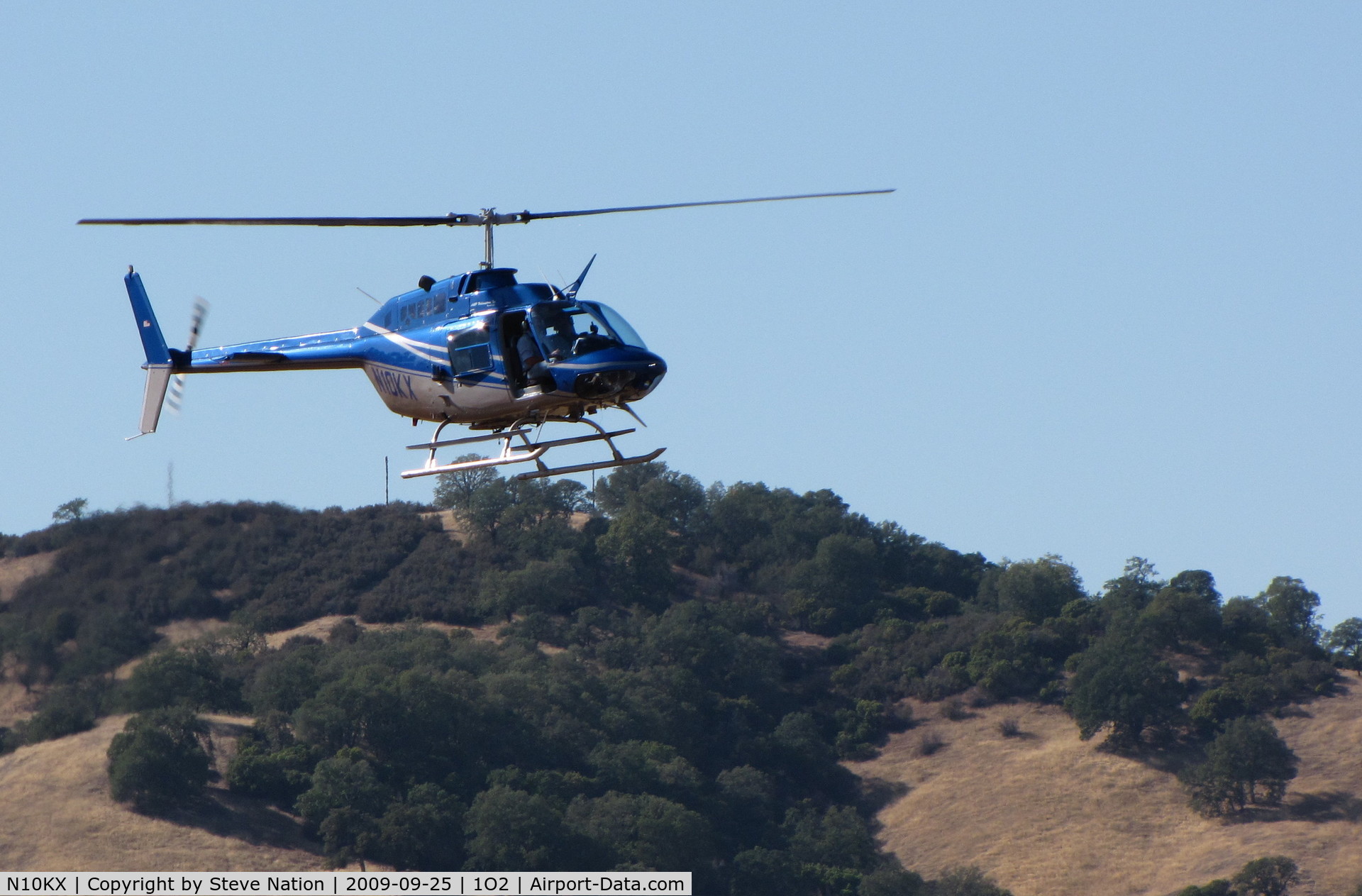 N10KX, 1975 Bell 206B JetRanger II C/N 1628, 1975 Bell 206B on approach to Lampson Field (no longer dusting)