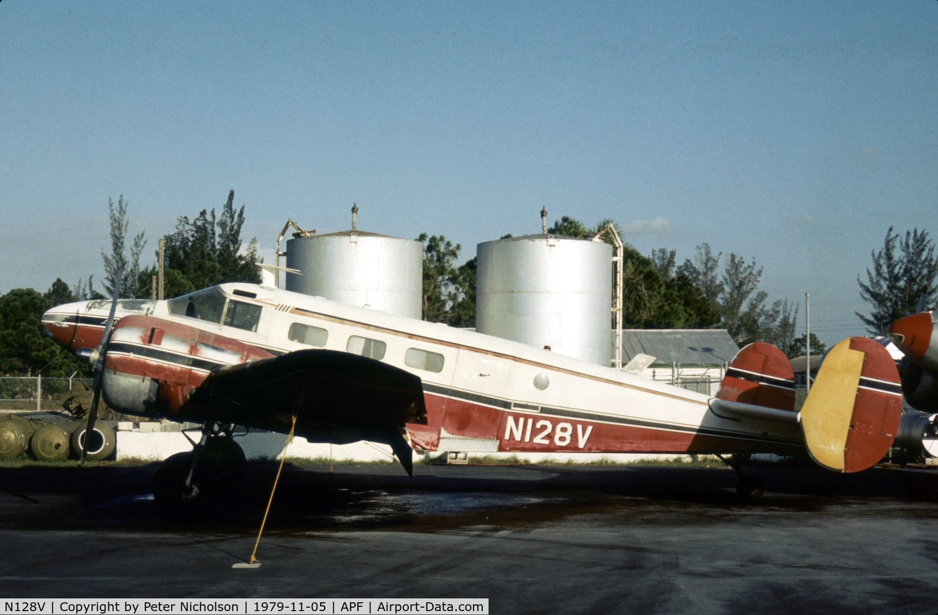 N128V, 1952 Beech C-45H Expeditor C/N AF-771, C-45H of Collier Mosquito Control as seen at Naples in November 1979.