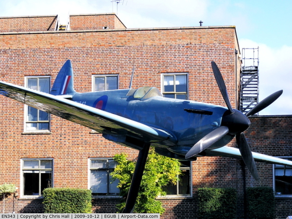 EN343, Supermarine Spitfire PRXI Replica C/N BAPC.226, RAF Benson Gate Guard, Painted to represent EN343 Spitfire PRXI flown by, then, Flying Officer Fray on the morning of the 17th May 1943 to photograph the Mohne and Sorpe Dams after the successful raid by 617 (Dam Busters)Squadron.