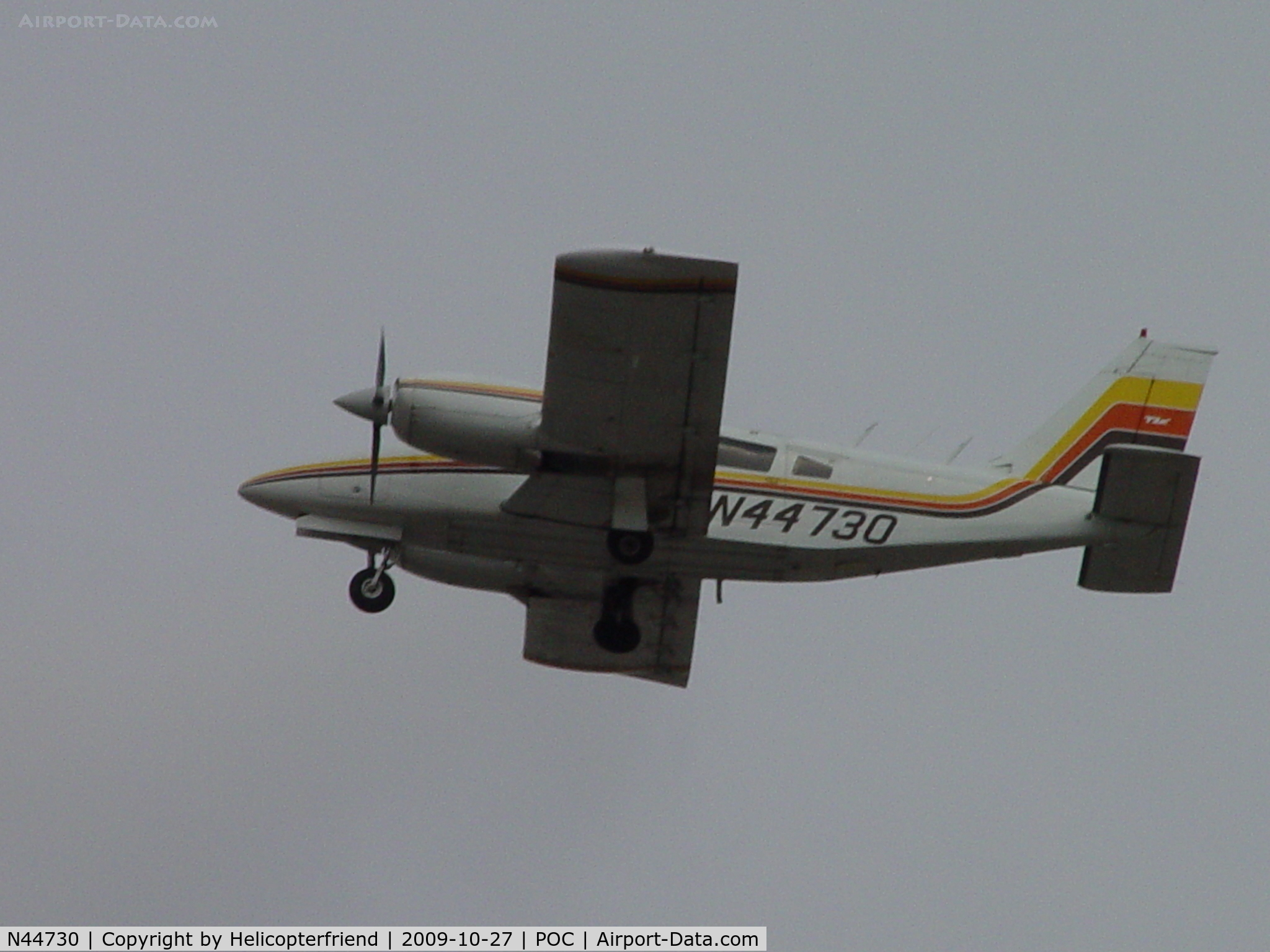 N44730, 1974 Piper PA-34-200T Seneca II C/N 34-7570005, Taking off from runway 26L and climbing out