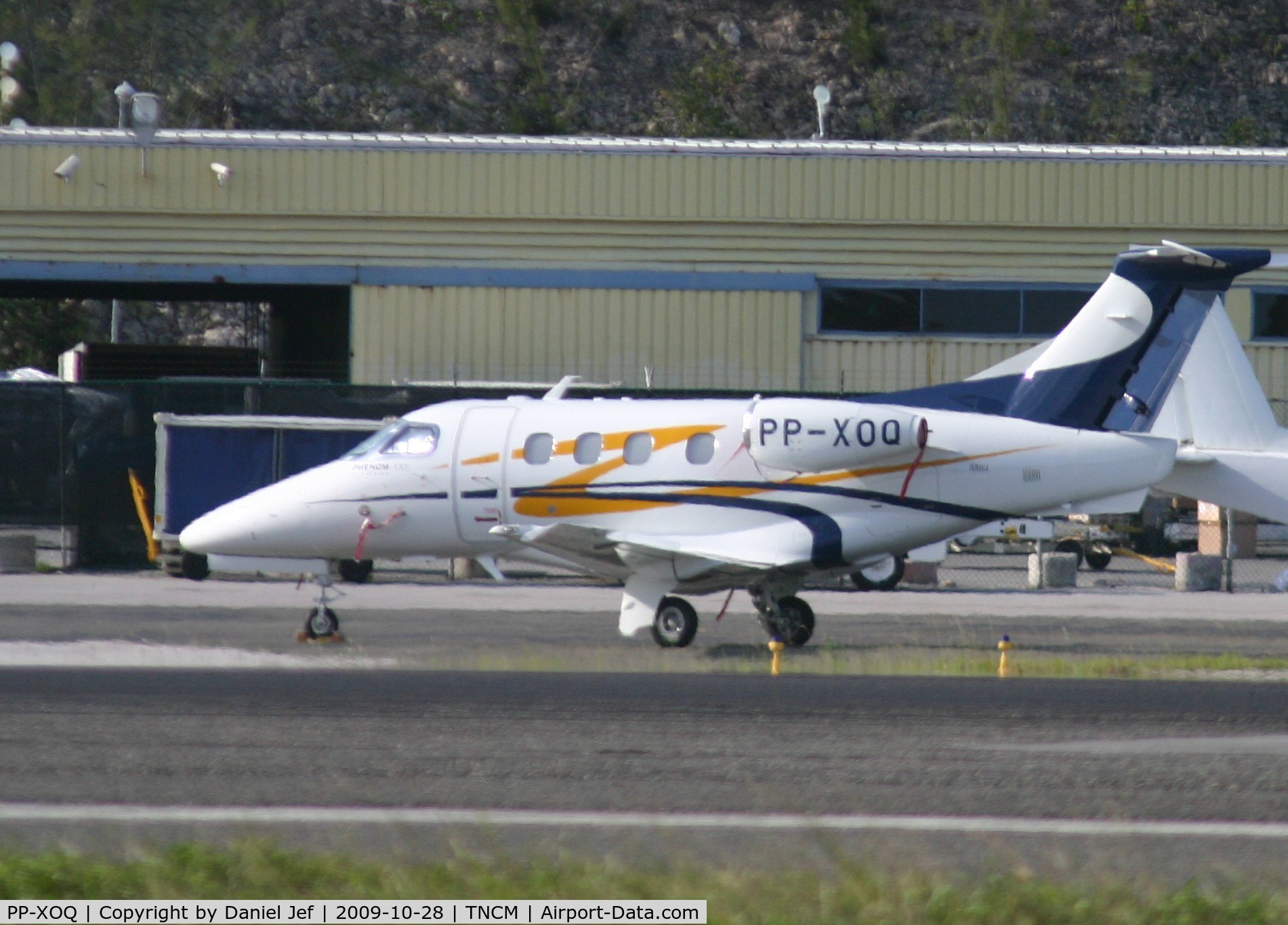 PP-XOQ, 2009 Embraer EMB-500 Phenom 100 C/N 50000007, Park at the cargo ramp