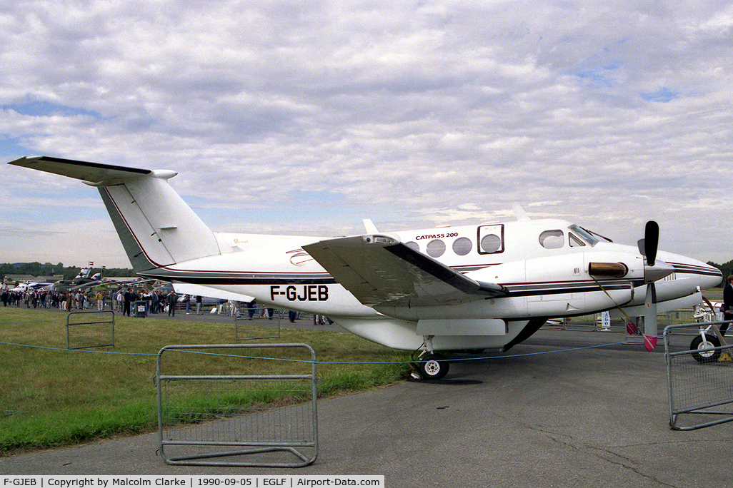 F-GJEB, 1975 Beech 200 Super King Air Catpass C/N BB-221, Beech 200. The passenger commuter version of this executive turboprop aircraft. Equipped with 11 passenger seats, cargo pod and wing lockers, it is pressurised and cruises at 290 mph. At the Farnborough Airshow in 1990.