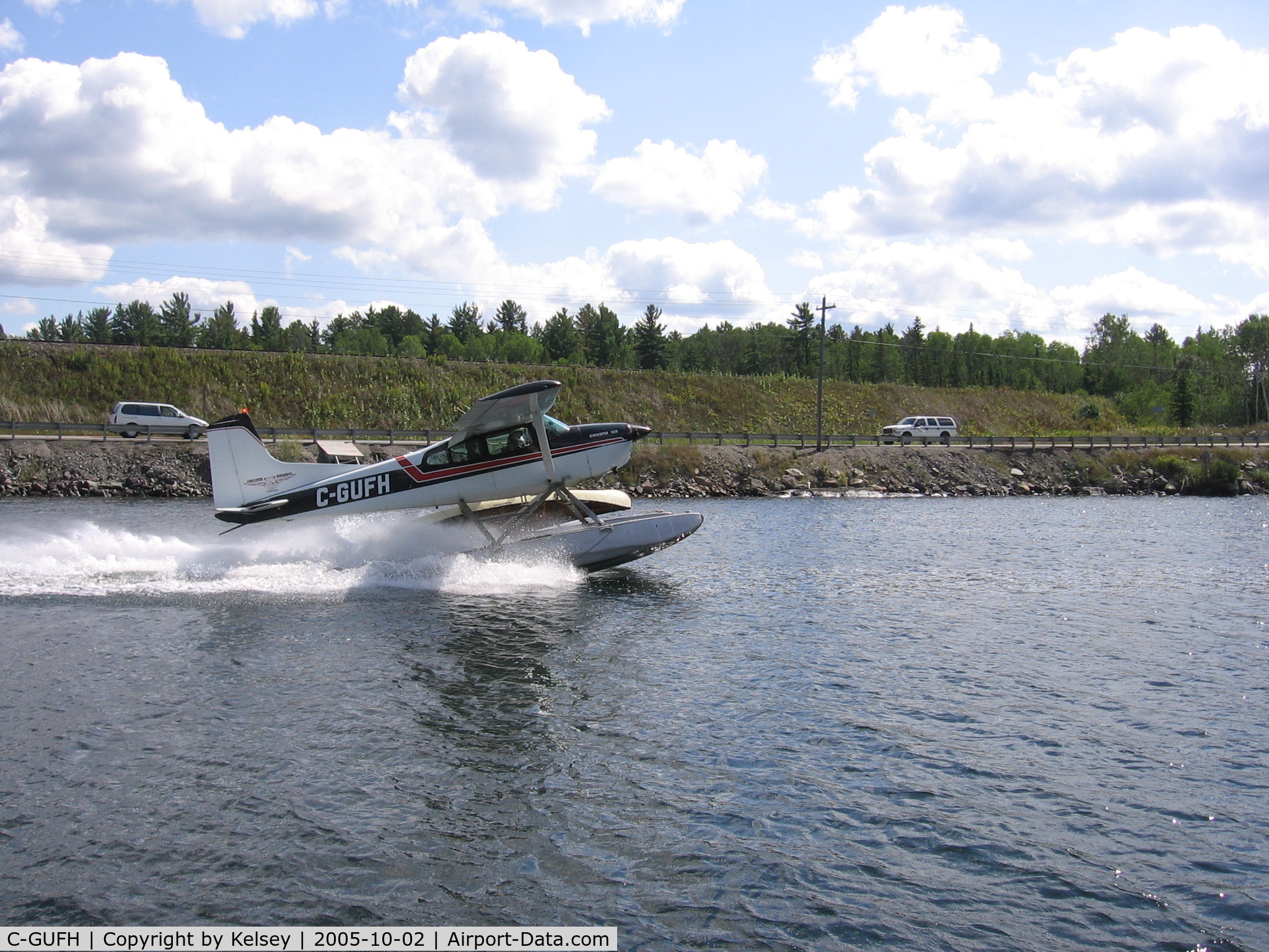 C-GUFH, 1975 Cessna A185F II Skywagon 185 C/N 18502857, On the slide with a canoe