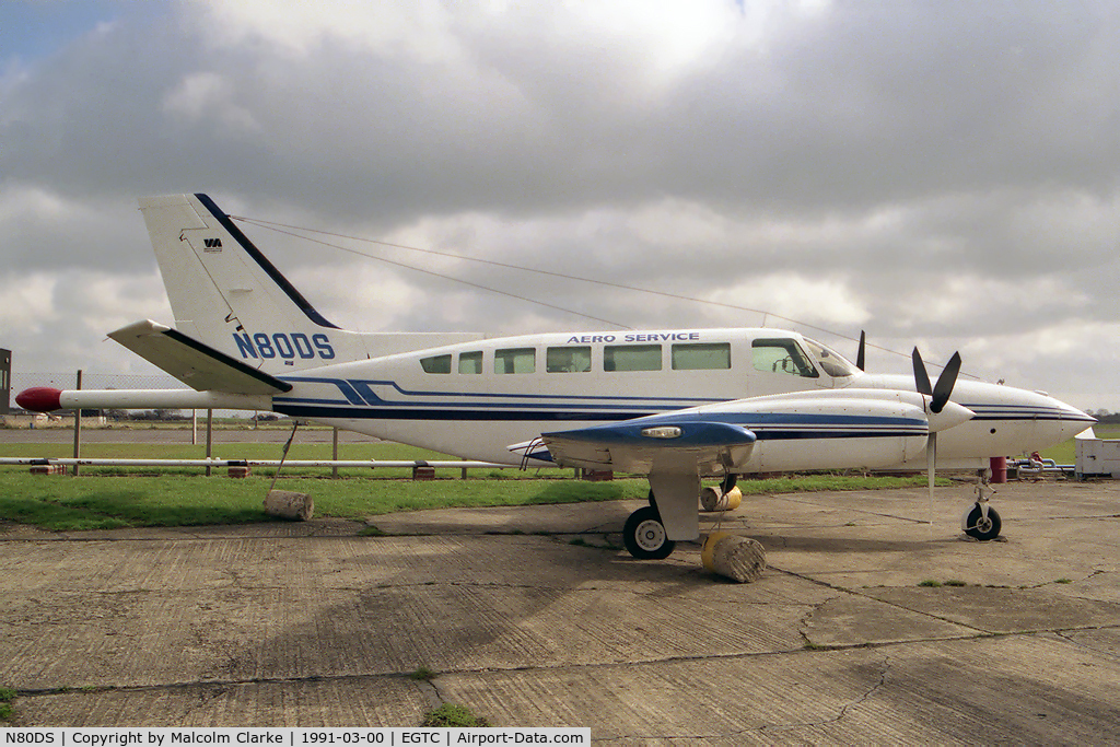 N80DS, Cessna 404 Titan Titan C/N 404-0427, Cessna 404 Titan at Cranfield Airport, UK. Aero Service was a Geophysical Service company, conducting aeromagnetic surveys. The 'tail stinger' housed a magnetometer that made observations of the earth's magnetic field.