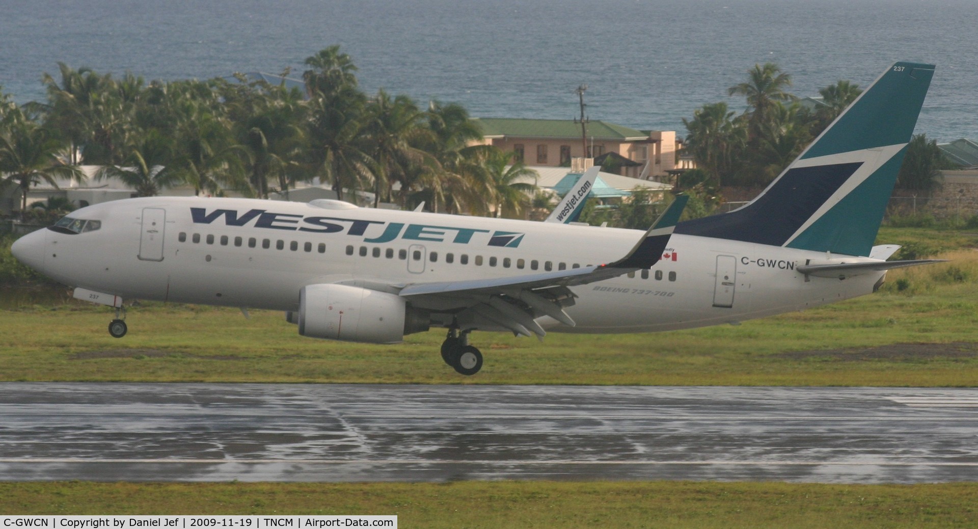C-GWCN, 2005 Boeing 737-7CT C/N 34157, West jet landing at St Maarten