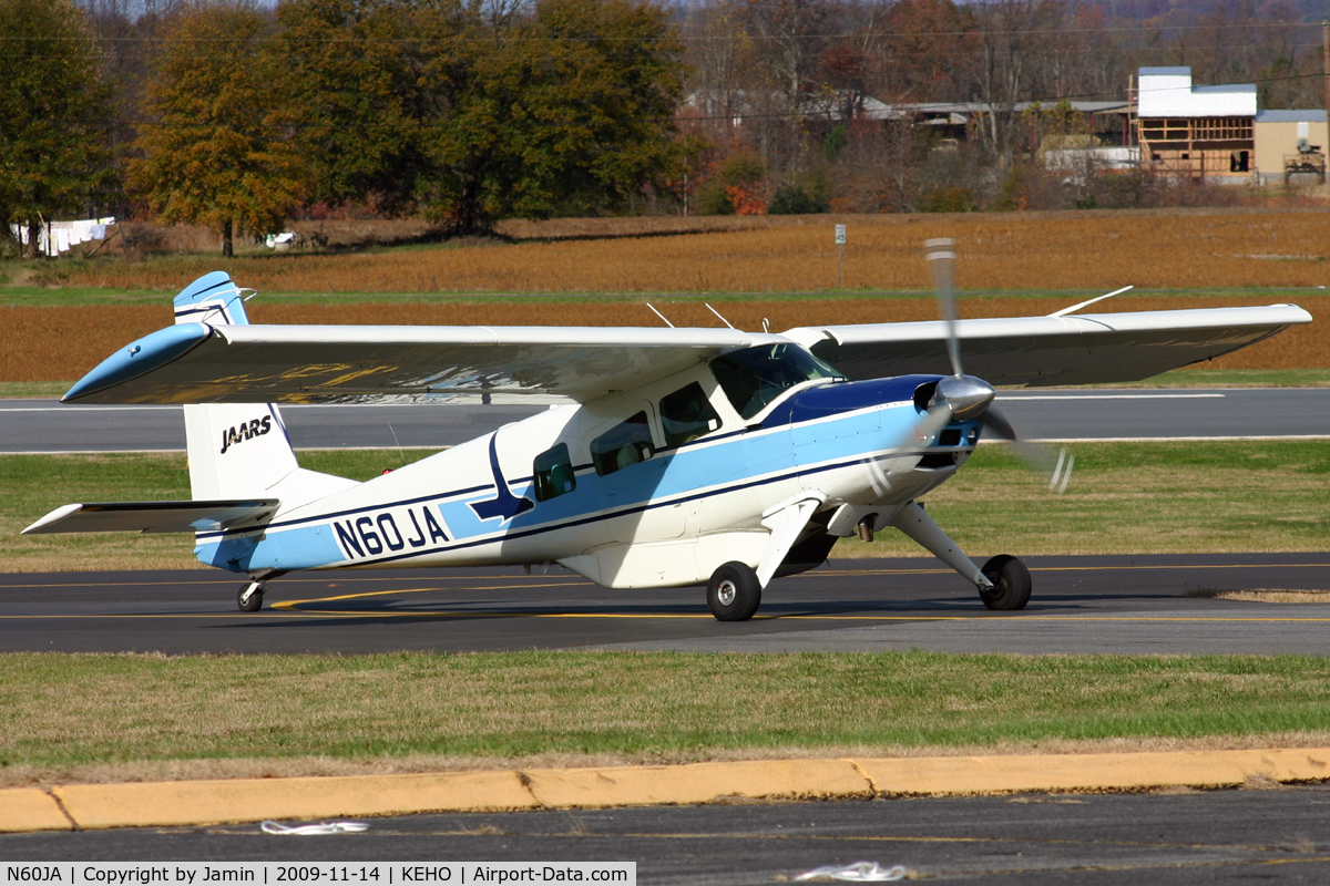 N60JA, 1967 Helio H-295/U10D C/N c/n 1240 (66-14338), Taxiing up the hill to the ramp during a fly-in.