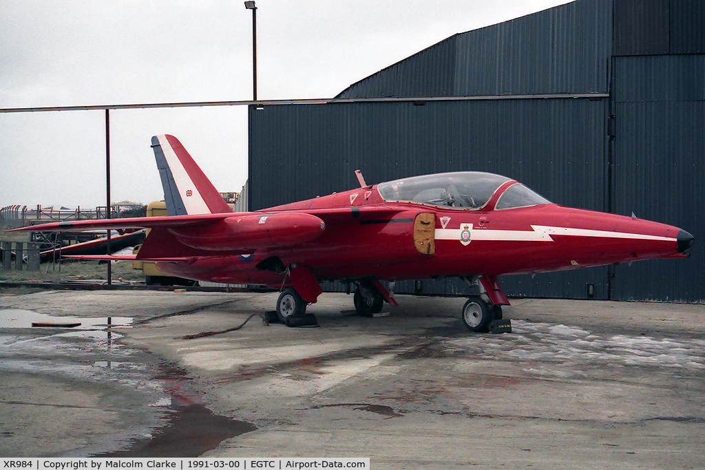 XR984, 1966 Hawker Siddeley Gnat T.1 C/N FL581,  Hawker Siddeley Gnat T1. Previously with RAF 4 FTS and No 1 SoTT. Seen here in 1991 at the VAT facility at Cranfield prior to shipment to the USA. Now at the San Diego Flight Museum (N316RF).