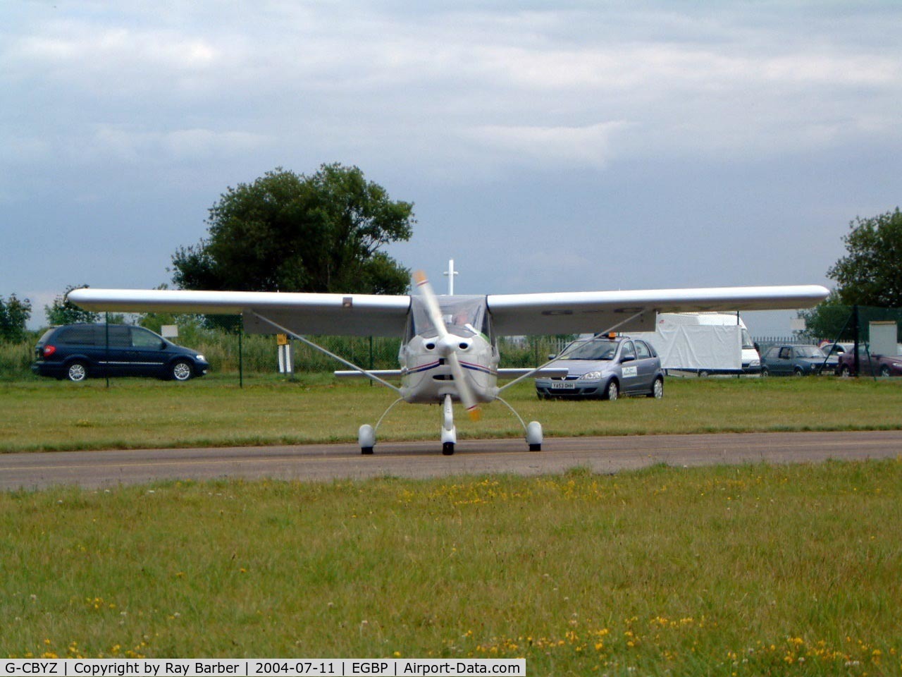 G-CBYZ, 2003 Tecnam P-92EA Echo Super C/N PFA 318A-13984, Tecnam P.92-EA Echo [PFA 318A-13984] Kemble~G 11/07/2004. Seen at the PFA Fly in 2004 Kemble UK. Reminds me of a face looking nose on with the prop spinner as the nose. 