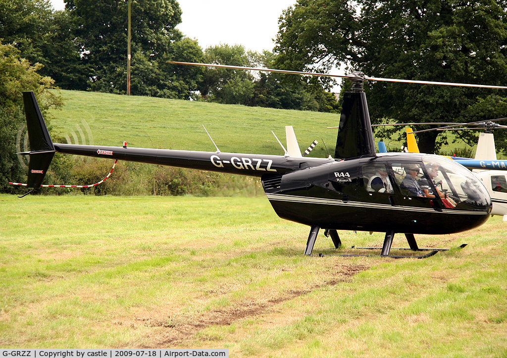 G-GRZZ, 2008 Robinson R44 Raven II C/N 12149, seen @ Cholmondeley
