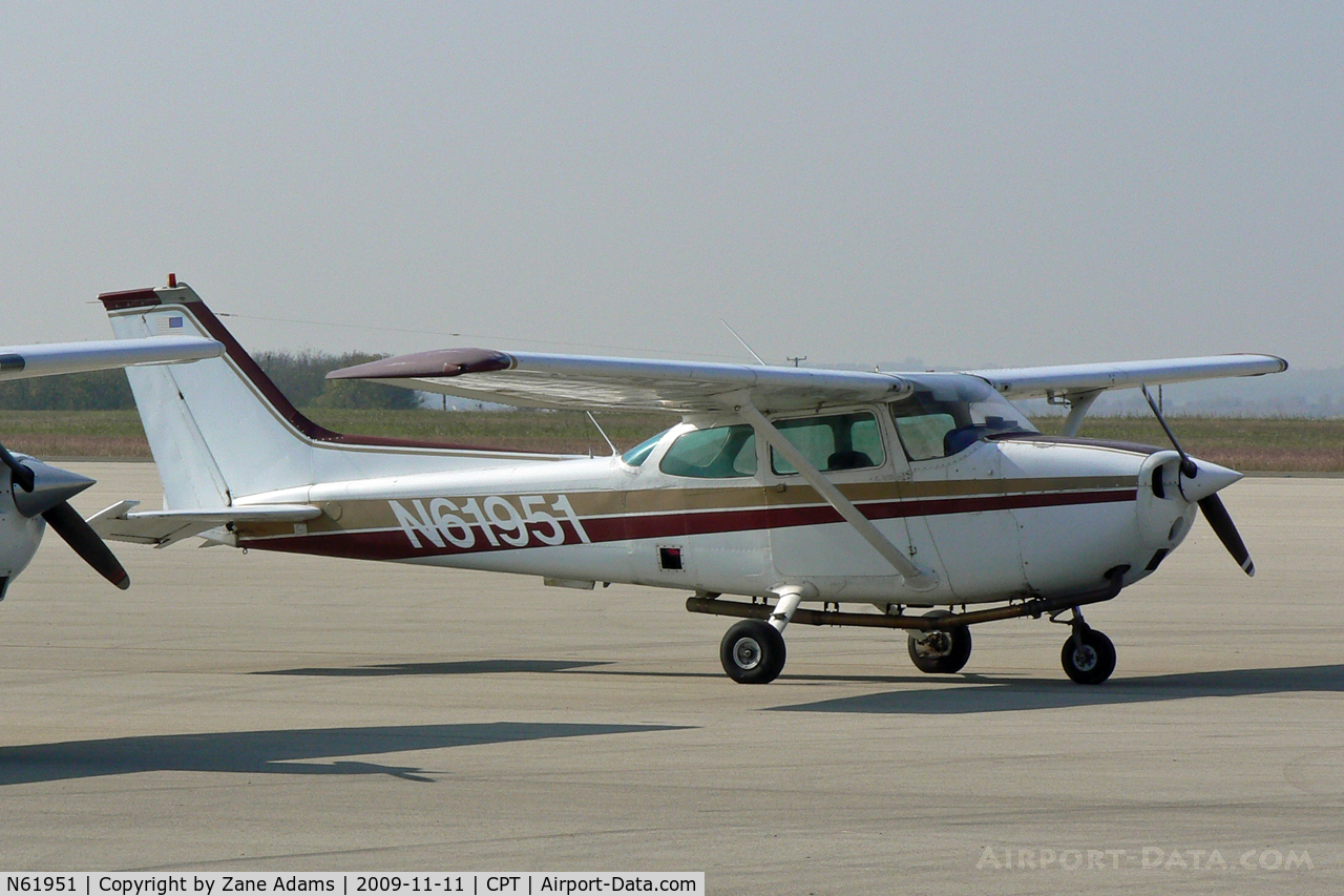 N61951, 1975 Cessna 172M C/N 17264908, At Cleburne Municipal - Notice extended exhaust pipe to clear the camera port on the starboard side. This aircraft is used for photo survey and mapping.