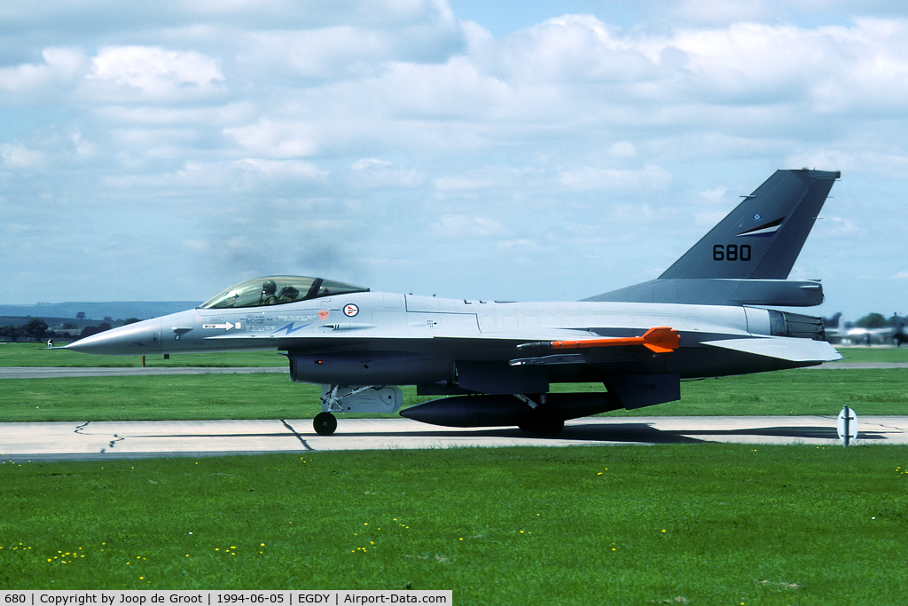 680, 1980 General Dynamics F-16AM Fighting Falcon C/N 6K-52, Norwegian participation of the 50 years D-Day celebrations. The smoke in the background is from a couple departing MiG-29s.