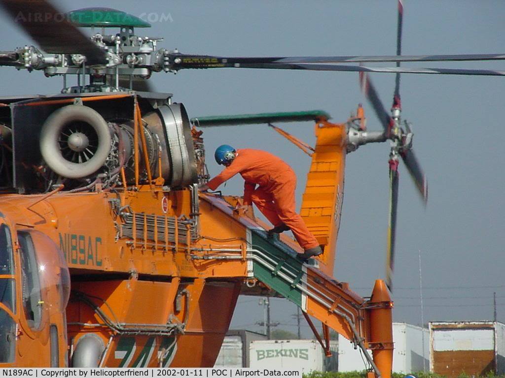 N189AC, 1997 Erickson S64E Skycrane C/N 641001, Crawling down after checking for oil leaks