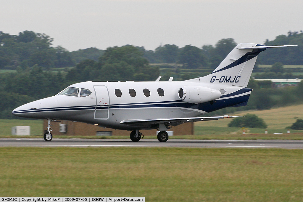 G-OMJC, 2003 Raytheon 390 Premier I C/N RB-88, Rolling down Runway 26 at Luton.