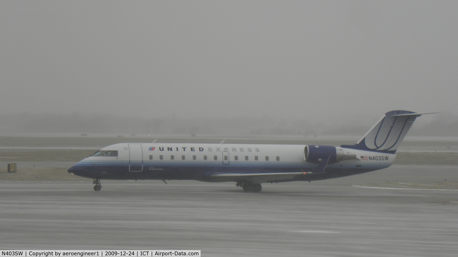 N403SW, 1993 Canadair CRJ-100LR (CL-600-2B19) C/N 7028, UA6018 (N403SW) is arriving to ICT from ORD on Christmas Eve...