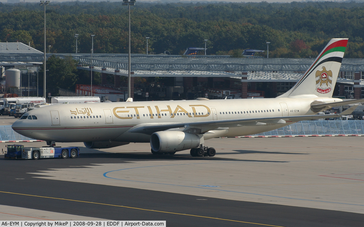 A6-EYM, 2007 Airbus A330-243 C/N 824, Pushing for departure from T2.