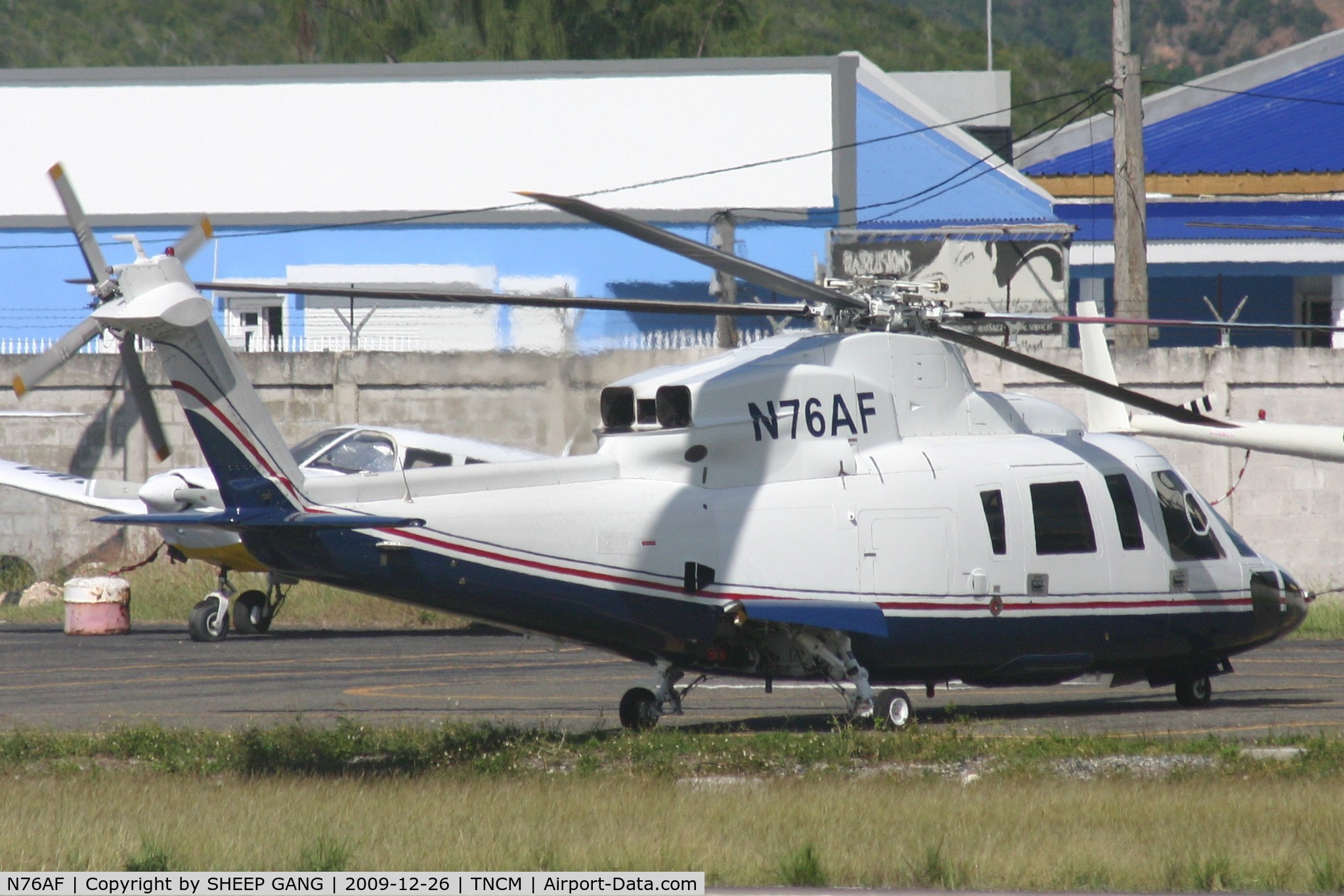 N76AF, 2003 Sikorsky S-76C C/N 760533, N76AF park on the helipad TNCM