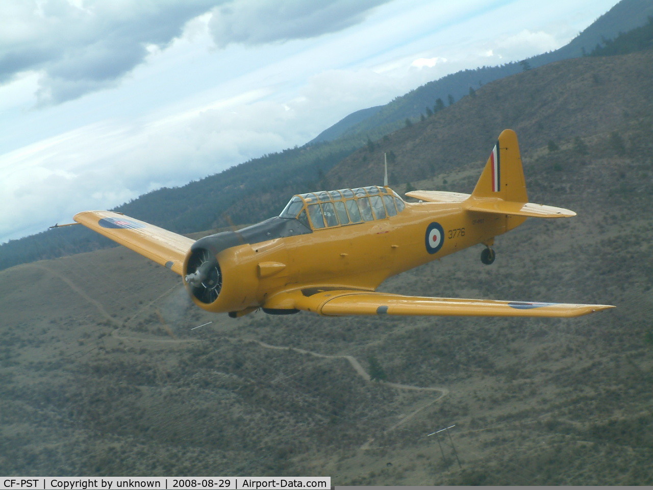 CF-PST, 1943 North American Harvard II C/N 81-4043, air-to-air