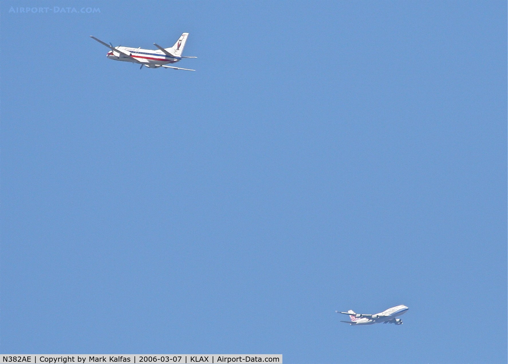 N382AE, Saab 340B C/N 340B-382, American Eagle SAAB 340B, 25R departure and Air China 744 downwind over SMO for the north complex KLAX.