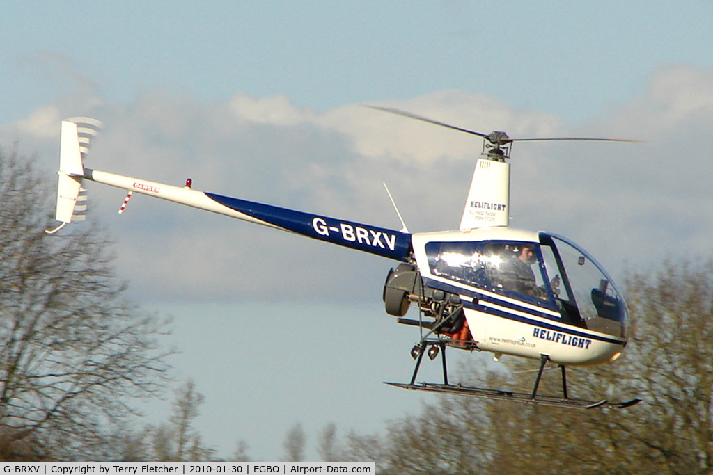 G-BRXV, 1989 Robinson R22 Beta C/N 1246, Part of a busy aviation scene at Wolverhampton (Halfpenny Green) Airport on a crisp winters day