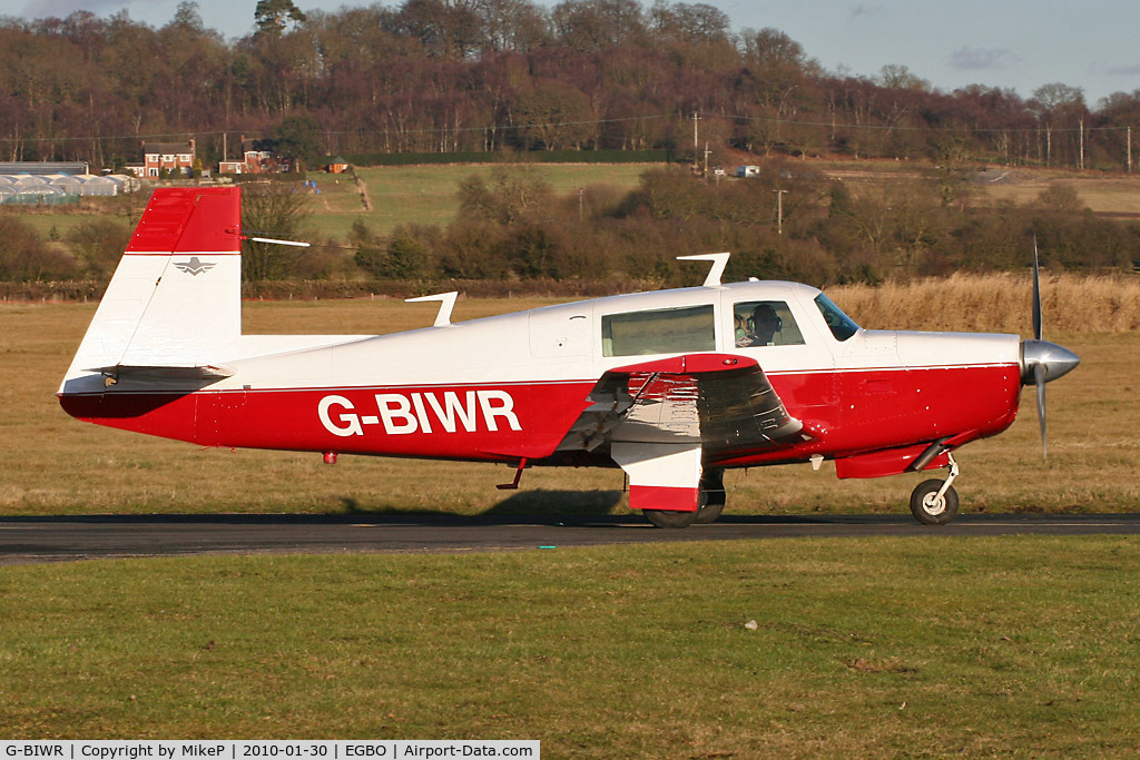 G-BIWR, 1976 Mooney M20F Executive C/N 22-1339, Looking great in this new red colour scheme - this 1976 veteran Mooney heads for the 34 hold.