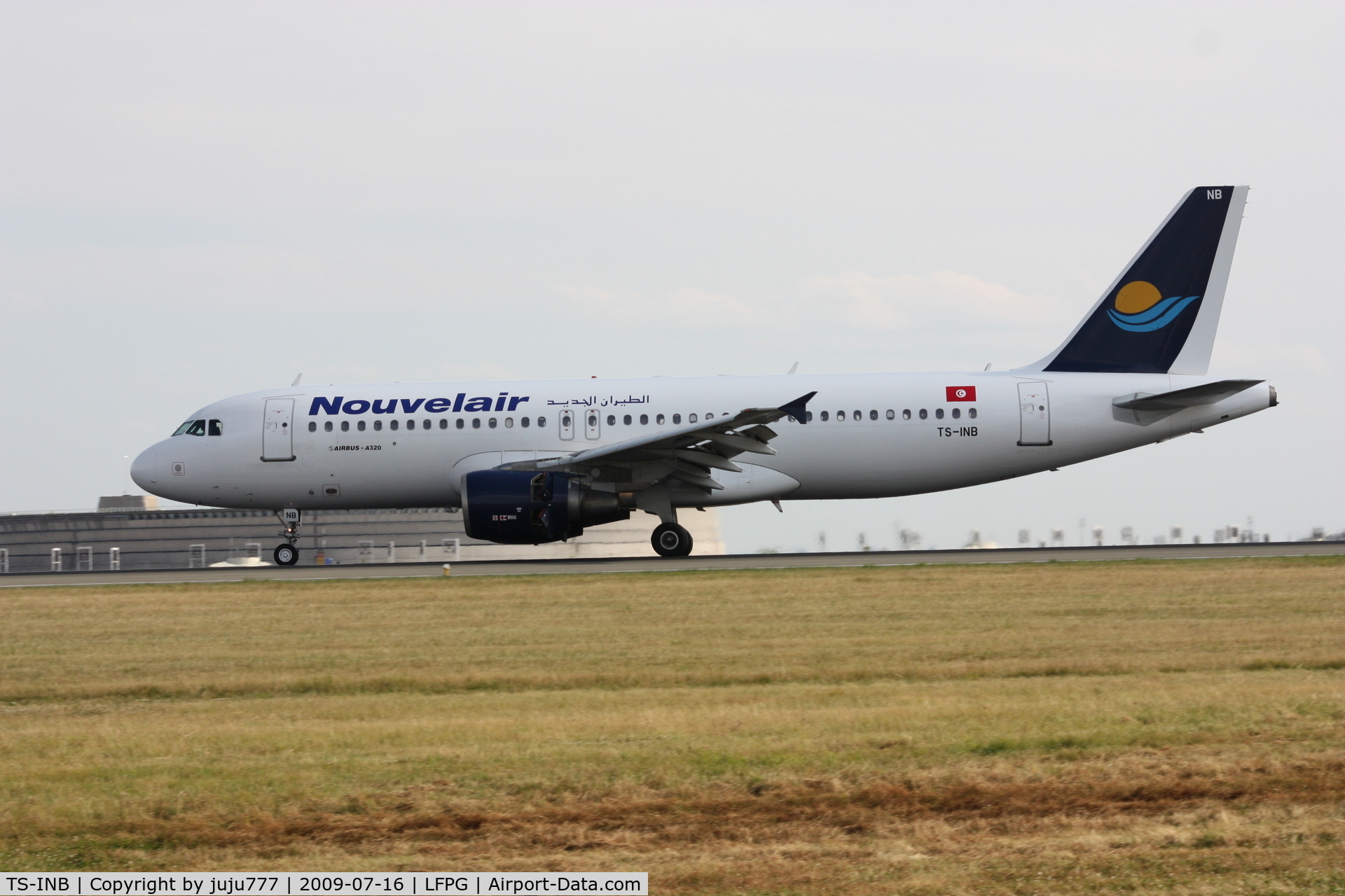 TS-INB, 2000 Airbus A320-214 C/N 1175, on landing at CDG whis new color