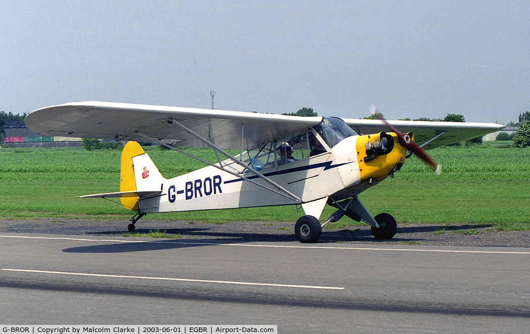G-BROR, 1943 Piper L-4H Grasshopper (J3C-65D) C/N 10885, Piper L-4H Grasshopper at Breighton Airfield in 2003.