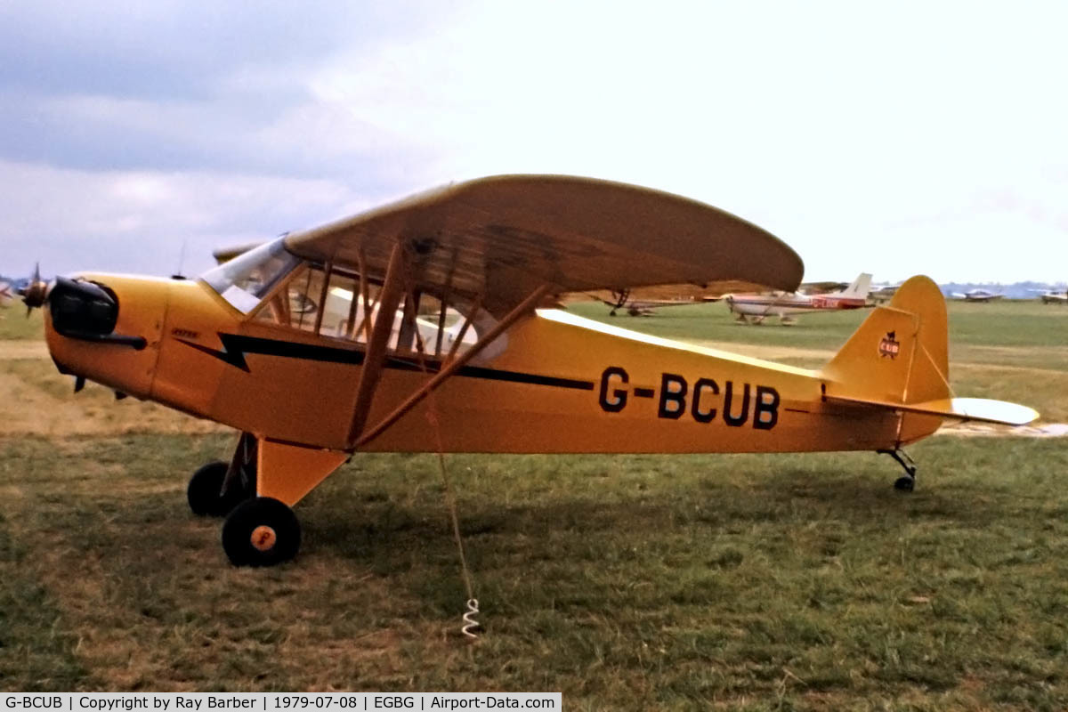 G-BCUB, 1943 Piper J3C-65 Cub (Lippert Reed Conversion) Cub C/N 13186, Piper J-3C-65 Cub [13370] Leicester~G 08/07/1979. Seen at PFA Fly In Leicester in 1979 .Image from a slide.