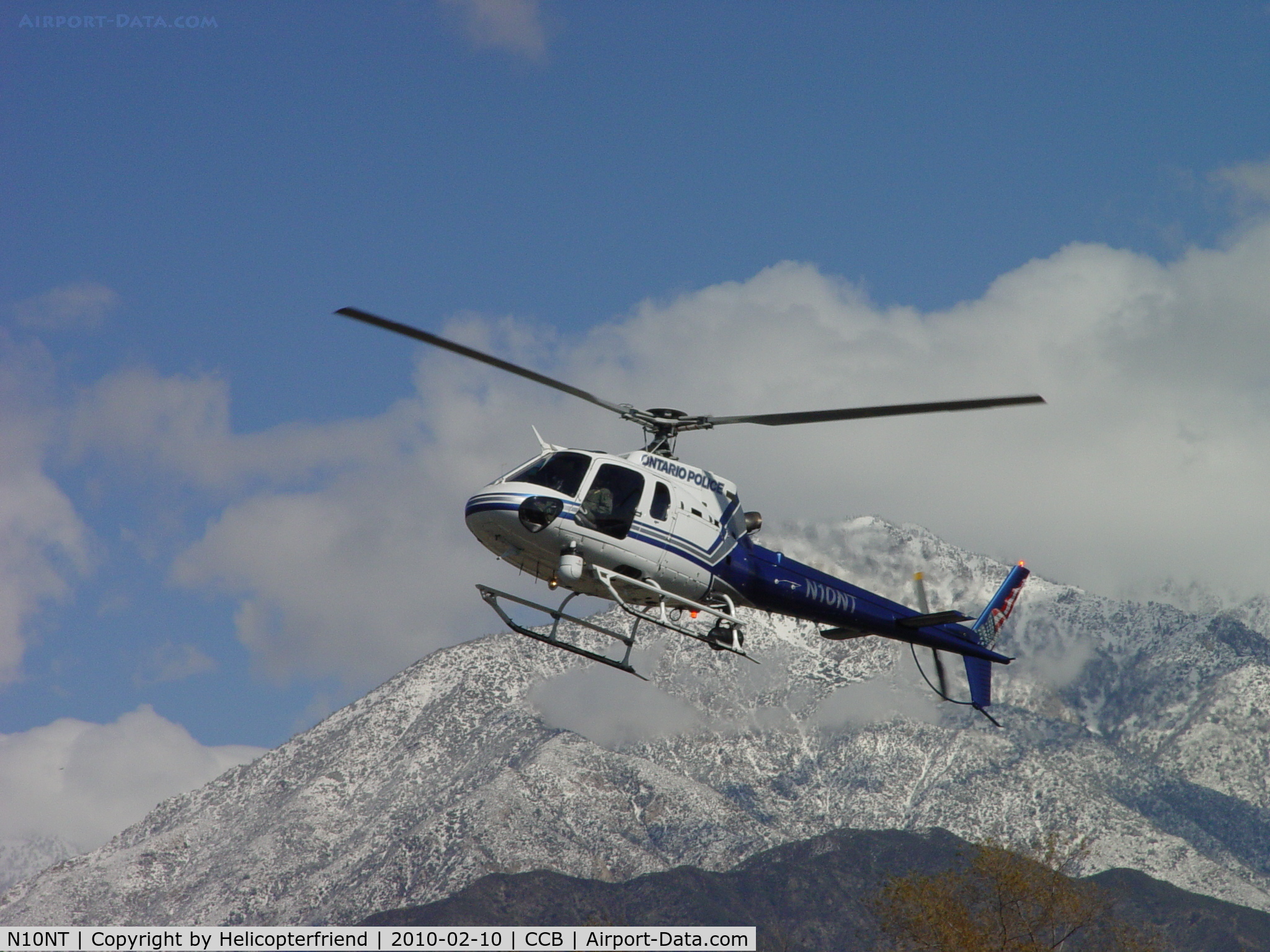 N10NT, 2002 Eurocopter AS-350B-2 Ecureuil Ecureuil C/N 3590, Flaring south of the snow capped peaks for OPD Helipad