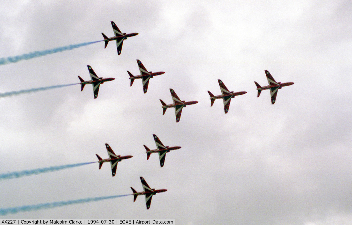 XX227, 1978 Hawker Siddeley Hawk T.1A C/N 063/312063, British Aerospace Hawk T1A. The Red Arrows in Concord formation at RAF Leeming's Country Fair and Air Show in 1992.