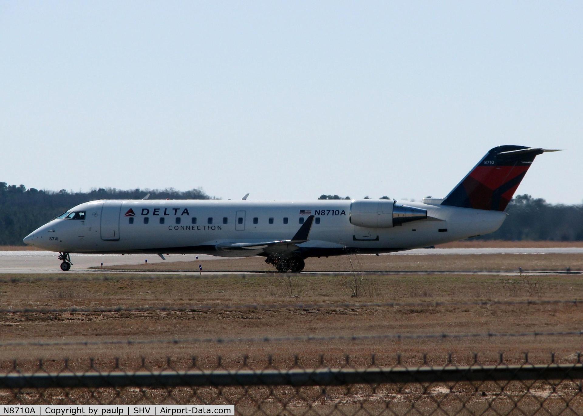 N8710A, 2002 Bombardier CRJ-200 (CL-600-2B19) C/N 7710, Taxiing to the active at Shreveport Regional.