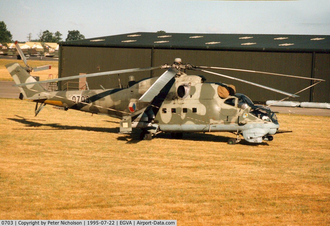 0703, Mil Mi-24V Hind E C/N 730703, Hind E helicopter gunship of 331 Squadron Czech Air Force on the flight-line at the 1995 Intnl Air Tattoo at RAF Fairford.