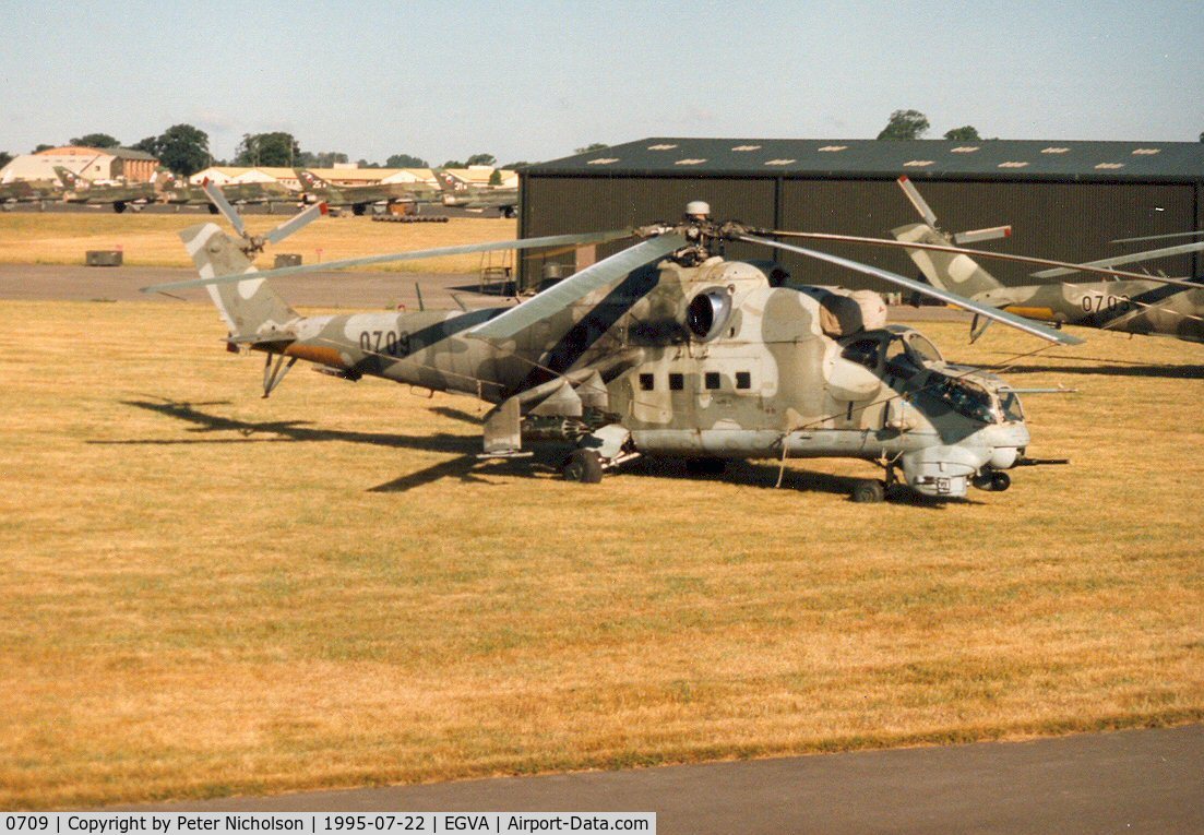 0709, Mil Mi-24V Hind E C/N 730709, Hind E helicopter gunship of 331 Squadron Czech Air Force on the flight-line at the 1995 Intnl Air Tattoo at RAF Fairford.