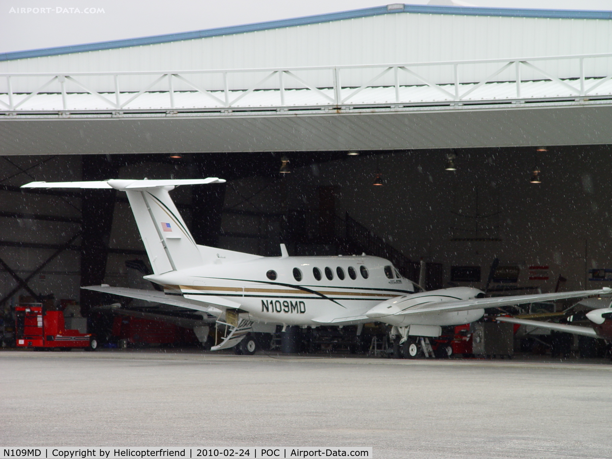 N109MD, 1985 Beech B200 King Air C/N BB-1213, Parked in Howard Aviation work area, out of the rain