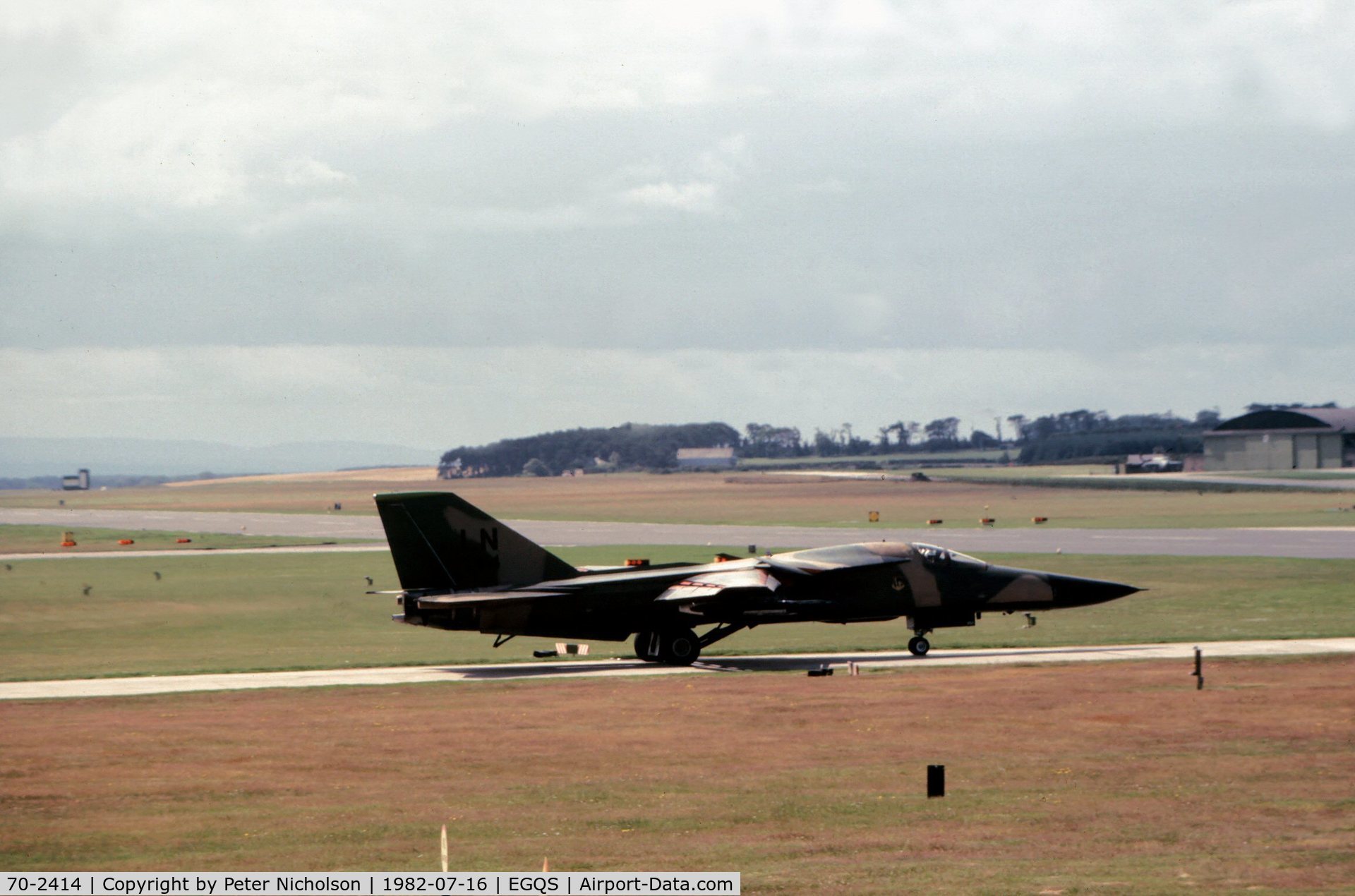 70-2414, 1970 General Dynamics F-111F Aardvark C/N E2-53, F-111F of 494th Tactical Fighter Squadron/48th Tactical Fighter Wing at RAF Lakenheath preparing to join the active runway at RAF Lossiemouth in the Summer of 1982.