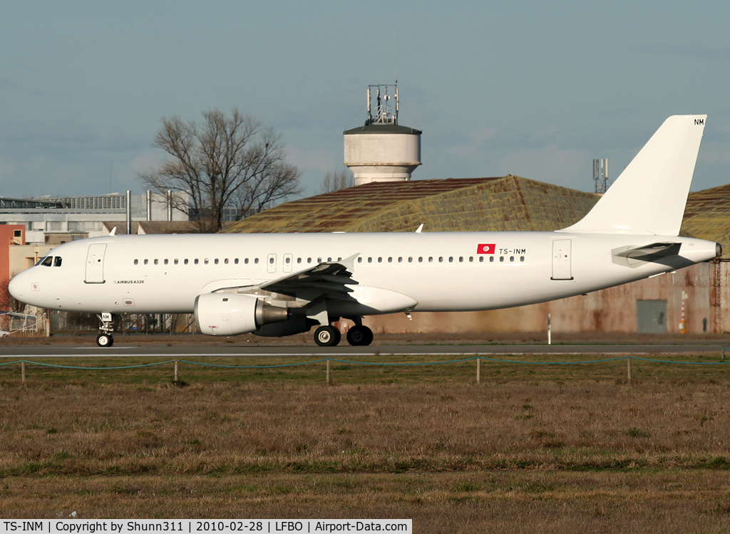 TS-INM, 1991 Airbus A320-211 C/N 246, Ready for take off rwy 32R in all white... Ex. Afriqiyah c/s