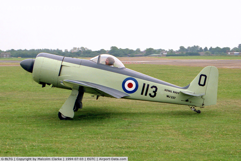 G-BLTG, 1986 WAR Hawker Sea Fury C/N PFA 120-10721, WAR Hawker Sea Fury. A half scale replica of the famous Royal Navy aircraft, sadly destroyed in an accident at Crosland Moor in 1996. Seen here at the PFA Rally,Cranfield in 1994