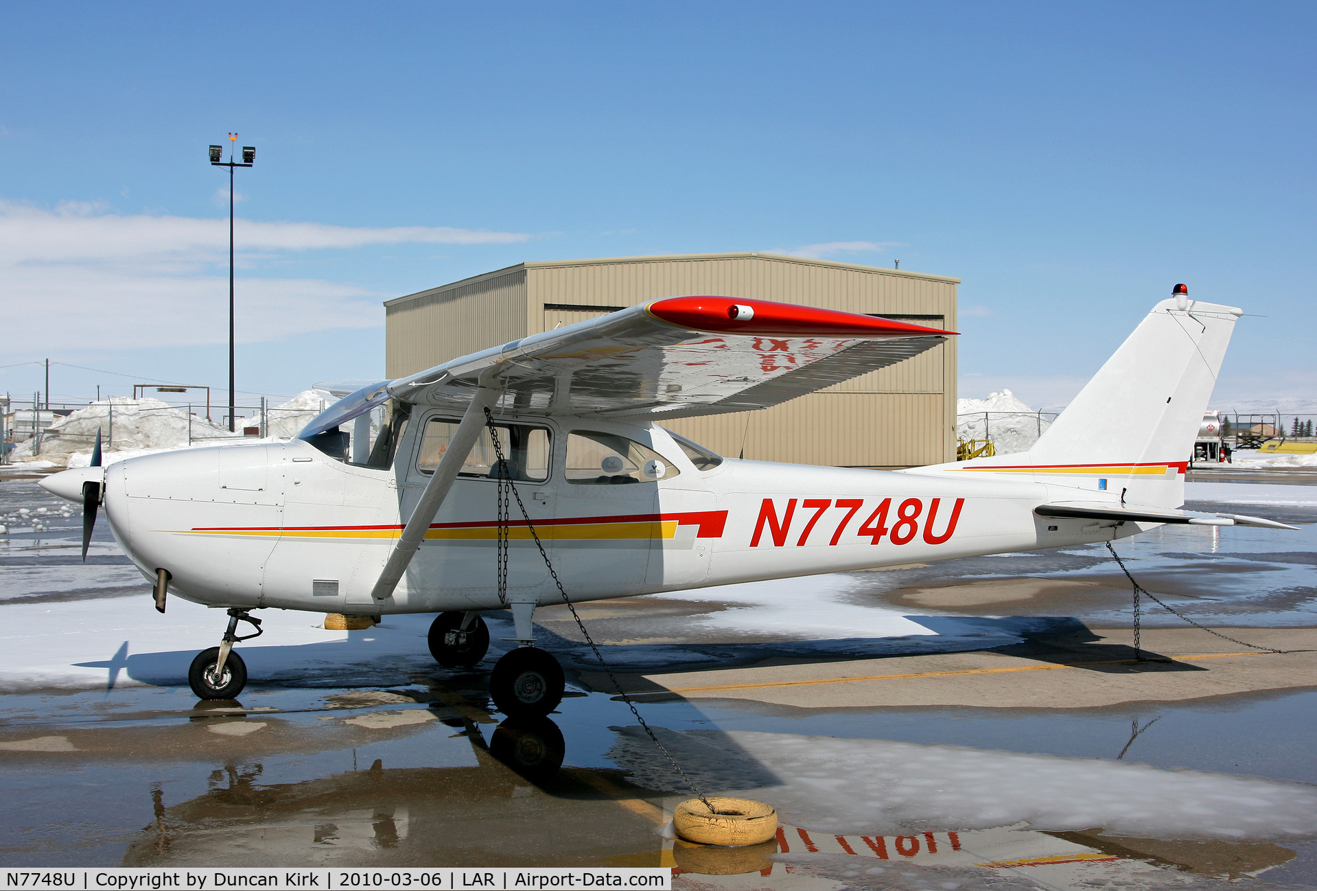 N7748U, 1964 Cessna 172E C/N 17251748, Bright winter's day at Laramie