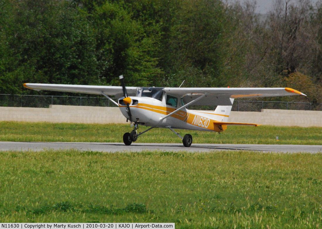 N11630, 1974 Cessna 150L C/N 15075584, Landing flare Runway 25