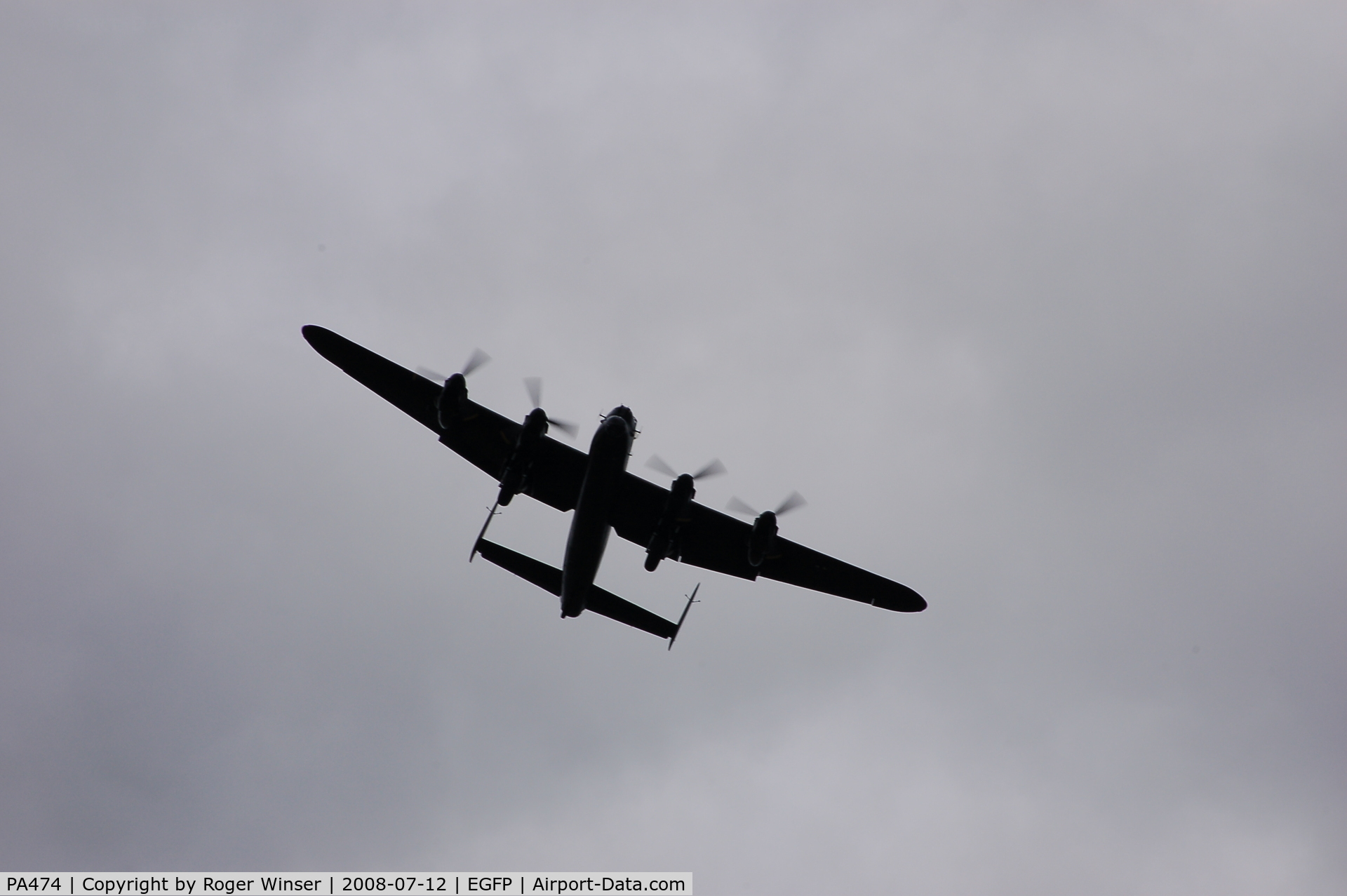 PA474, 1945 Avro 683 Lancaster B1 C/N VACH0052/D2973, Off airport. BBMF Lancaster over Pembrey Airport representing aircraft HW-R and BQ-B. Seen after displaying at nearby Kidwelly Carnival.