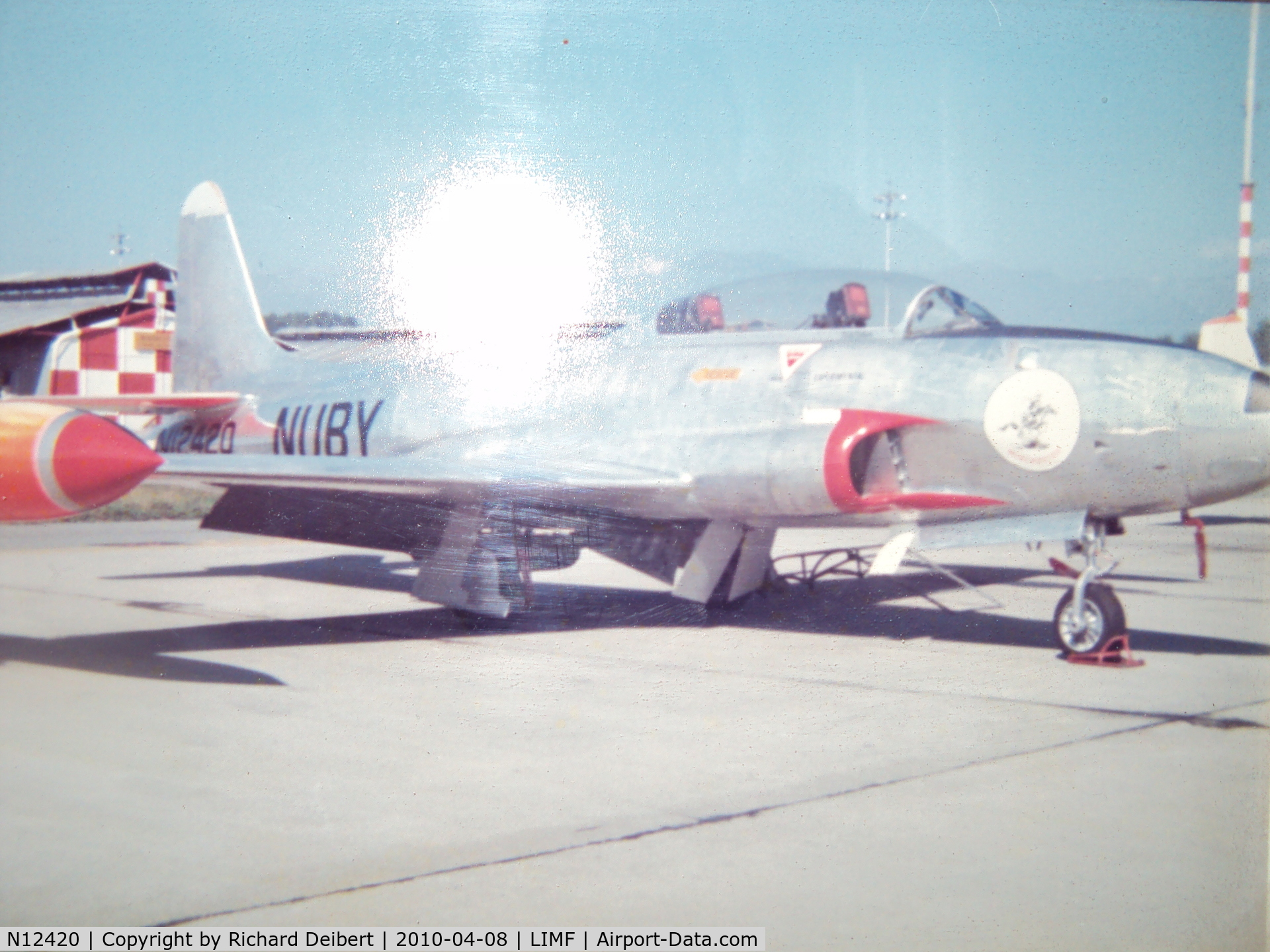 N12420, Canadair T-33 Silver Star 3 C/N T33-200, Photo taken on the tarmac at Caselli Airport, Turino Italy in July 1973. Aircraft was used on the anti-hail program operated by Winchester, Roma. Pilot was Richard Deibert, an ex navy fighter pilot.