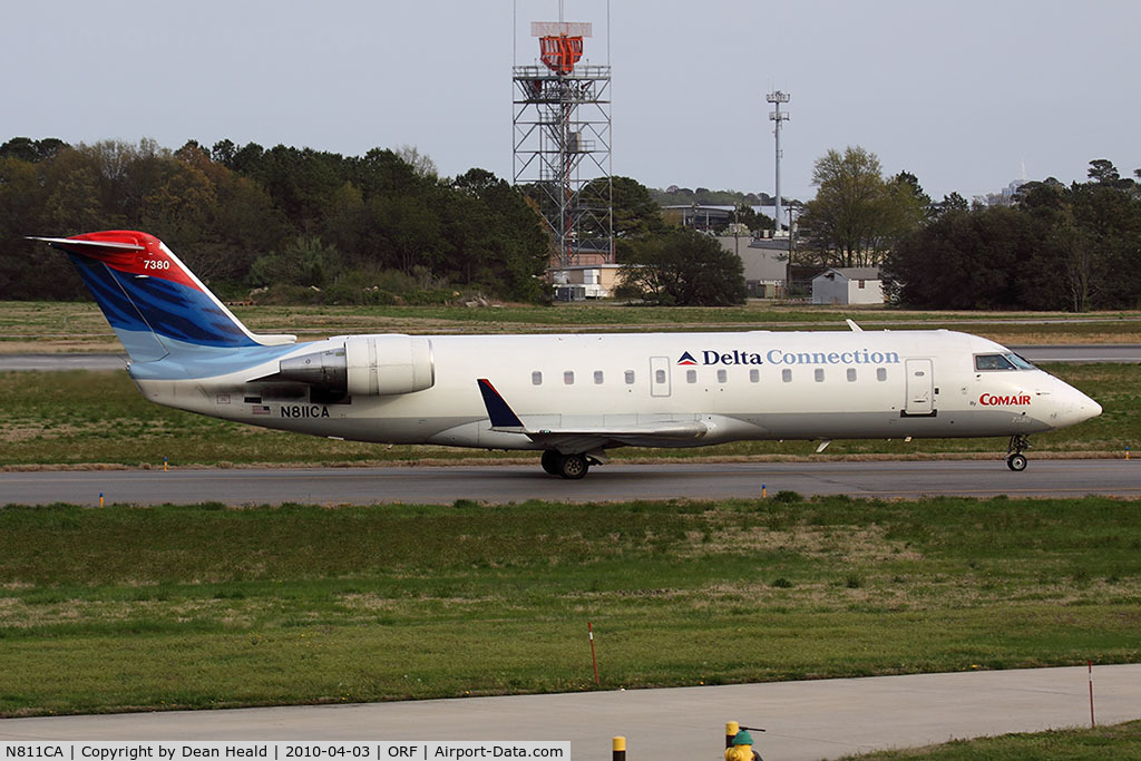 N811CA, 2000 Bombardier CRJ-100ER (CL-600-2B19) C/N 7380, Delta Connection (Comair) N811CA, originally bound for JFK, taxiing back to the gate.