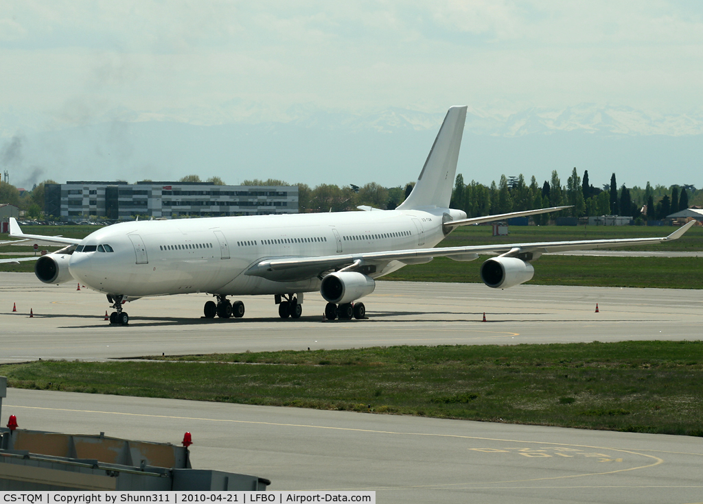 CS-TQM, 1995 Airbus A340-313 C/N 117, Parked at the cargo area in all white c/s