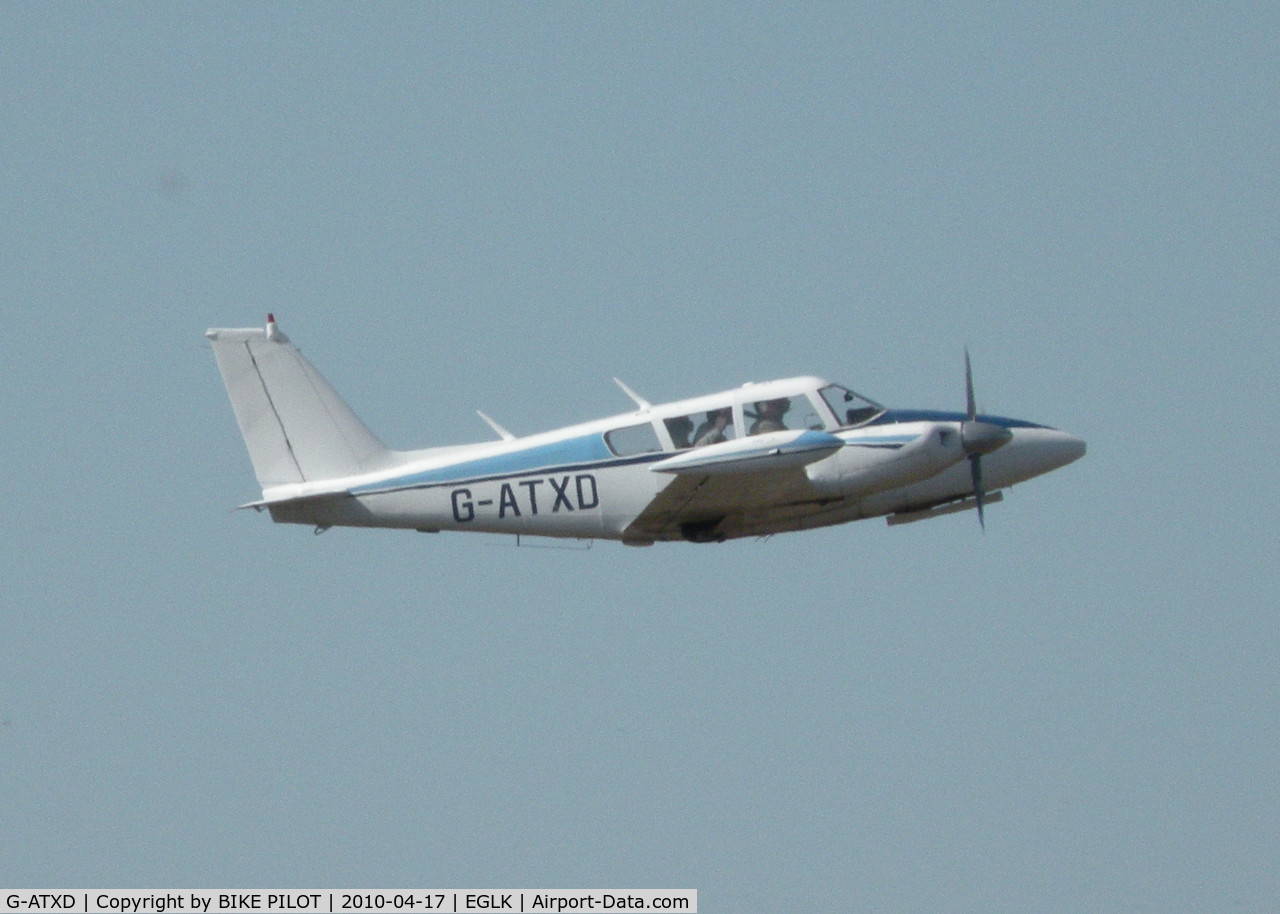 G-ATXD, 1966 Piper PA-30-160 B Twin Comanche C/N 30-1166, RESIDENT TWIN COMANCHE CLIMBING OUT FROM RWY 07
