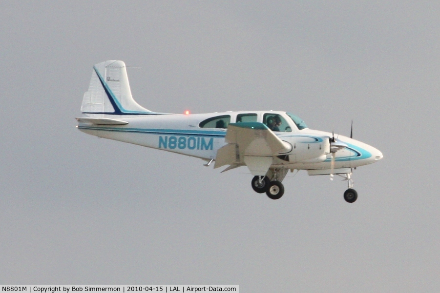 N8801M, 1964 Beech D95A Travel Air C/N TD-569, Arriving at Lakeland, FL during Sun N Fun 2010.