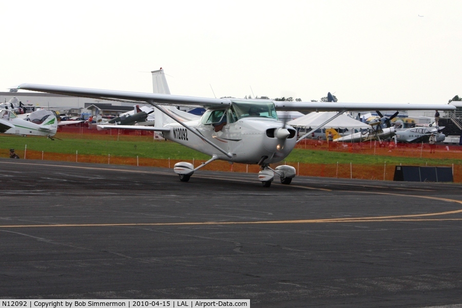 N12092, 1973 Cessna 172M C/N 17261802, Departing Lakeland, FL during Sun N Fun 2010