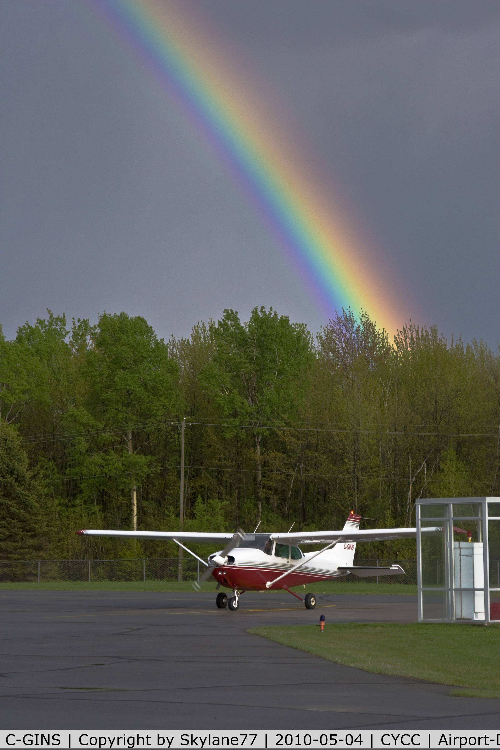 C-GINS, 1980 Cessna 172P C/N 17274449, A dark sky and a rainbow serve as a beautiful backdrop for C-GINS as it readies to depart into clear skies to the west.