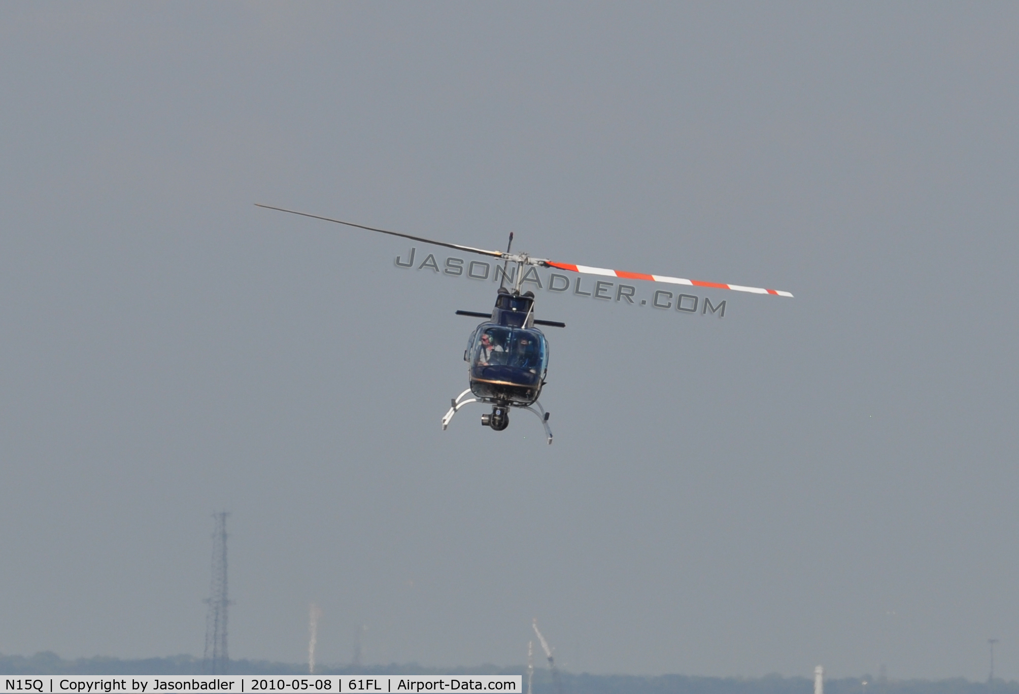 N15Q, Bell 206B JetRanger III C/N 2235, I shot this aircraft which was hovering around the Tampa Convention Center in downtown Tampa. I'm not sure what was going on, but I am assuming that some people were looking about buying this aircraft, but who knows.
