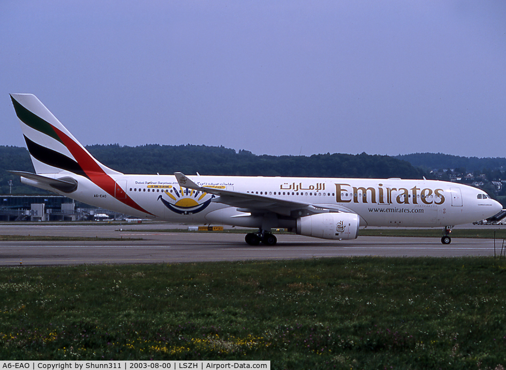 A6-EAO, 2003 Airbus A330-243 C/N 525, Taxiing to the terminal with Dubai Summer Suprise logojet...