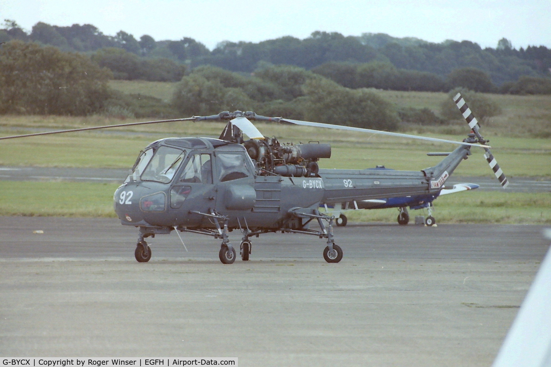 G-BYCX, 1973 Westland WASP MK1B C/N F9754, Visiting ex-South African Air Force naval helicopter (coded 92) visiting Swansea Airport circa 2003. Operated by 22 Squadron SAAF in the maritime role. 