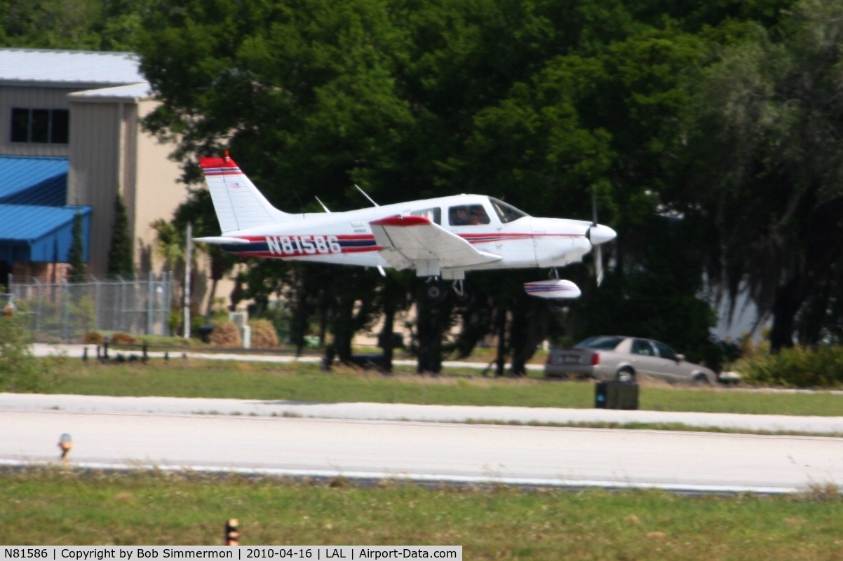 N81586, 1980 Piper PA-28-181 Cherokee Archer II C/N 28-8090245, Arriving at Lakeland, Florida during Sun N Fun 2010.
